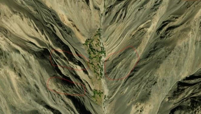 The three target zones (outlined in red) on the valley sides above Hilal Abad village.